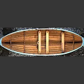Wooden Boat Display Model With Natural Hull And Blue Trim On Gravel Stand