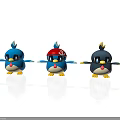 Cute Cartoon Bird Figurines With Blue Red Hat And Black Designs On Shiny Surface