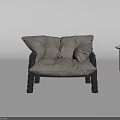 Plush Gray Single Sofa With Black Armrests Padded Seat And Sturdy Black Legs Design