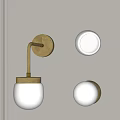Modern Wall Sconces with Brass Base and White Globe Shades for Interior Decor