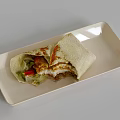 Delicious Sliced Burrito With Fresh Vegetables And Meat On White Plate