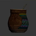 Handcrafted Decorative Cup With Colorful Woven Patterns And Leather Accents And Straw