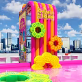 Pink Interactive Area With Colorful Decorations Striped Umbrellas Deck Chairs And City Skyline