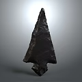 Ancient Stone Arrowhead Primitive Weapon With Pointed Tip And Textured Surface Isolated On Gray Background 3d model