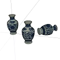 Traditional Blue and White Ceramic Vases with Intricate Floral Patterns Standing and Lying
