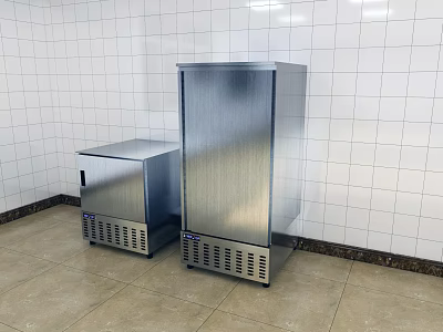 Commercial Kitchen Featuring Two Stainless Steel Refrigerators White Tiled Walls And Beige Flooring 3d model