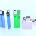 Everyday Household Lighters Including Transparent Blue Green And Silver Metal With Open Lid