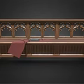 Wooden Public Bench With Gothic Carved Design Red Cloth And Books On Seat