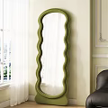 Green Wavy Frame Full Length Mirror Against Light Wall With White Curtain Black Sofa