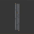 Blue Cylindrical Bars With Orange Ends Arranged Neatly On Dark Surface