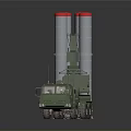 Military Vehicle Transporting Large Cylindrical Launchers With Red Top Sections