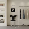 Stylish Clothing Rack Featuring Hanging Clothes Black Chair Shoes And Wall Art