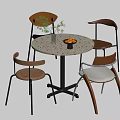 Modern Meeting Table and Chairs with Round Speckled Top Green Plant and Orange Fruits