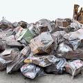 Heap of Garbage With Plastic Bags And Cardboard Boxes On Concrete Ground