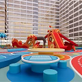 Vibrant Children's Play Area With Slides Round Tables Colorful Flooring And Tall Building Background
