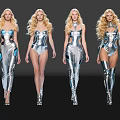 Four Models Walk In Futuristic Silver Metallic Bodysuits On Black Runway