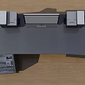 Black Functional Desk With Computer Monitor Speakers Control Panel And Wheels