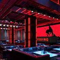 Industrial Style Bar Interior With Red Neon Lights And Moon Decor