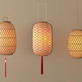 Three Different Design Hanging Lanterns With Woven Frames Red Tassels And Warm Light