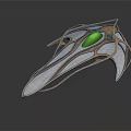 Futuristic Metallic Accessory With Silver Gold Finish Central Green Gemstone And Streamlined Wing Like Structures