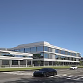 Modern Industrial Factory Building Featuring Multi Story Structure Large Glass Windows And Roadside Vehicles
