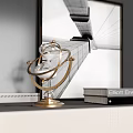 Elegant Gold Armillary Sphere Decor With Books And Black White Architectural Painting On White Shelf