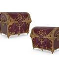 Maroon Vintage Chests With Golden Ornate Patterns Metal Locks And Decorative Feet