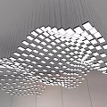 Stylish Modern Wave Shaped Chandelier With Square Light Panels Hanging In Ceiling