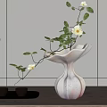 Modern Vase With White Blossoms And Green Leaves On Wooden Tabletop With Tea Set