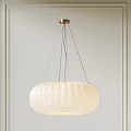 Minimalist White Ribbed Pendant Light With Brass Ceiling Base In Living Room