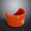 Red Carved Sculpture Bowl With Intricate Patterns On Dark Background