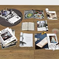 Scattered Open Books And Magazines With Interior Design Food Home Images On Wooden Floor