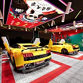 Car Beauty Shop Interior Featuring Yellow Sports Cars Red Neon Sign And Modern Decor