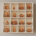 Various Clay Colored Ceramic Vessels Displayed In White Grid Shelf With Different Shapes 3d model