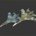 Two Military Fighter Jets With Blue And Green Camouflage Patterns