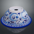 Blue and White Ceramic Sculpture Carving With Intricate Floral Patterns And Bowl Shape