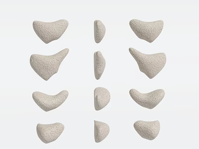 Gray Stone Wall Decor Pieces With Irregular Shapes Arranged in Rows 3d model