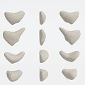 Gray Stone Wall Decor Pieces With Irregular Shapes Arranged in Rows