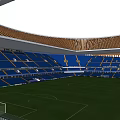 Modern Football Stadium With Green Pitch Blue Stands And Unique Roof Design