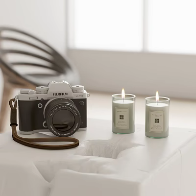 Fujifilm Digital Camera Display With Two Lit Candles On White Table Top 3d model