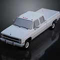White Double Cab Pickup Truck With Cargo Bed And Front Grille Design