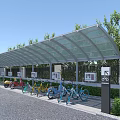 Transparent Roof Bike Shelter with Colored Bicycles Signage and Trees in Parking Lot