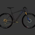 Black Mountain Bike With Golden Components Suspension Fork And Wide Tires