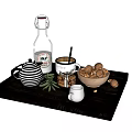 Fresh Walnuts And Olive Branch With Teapot Bottle And Drink On Wooden Tray