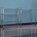 Silver Metal Multi Tiered Wire Shelving Unit Against Blue Wall With Gray Floor Reflection 3d model