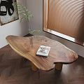 Wooden Coffee Table With Natural Edge Glass Vase Green Plant And Magazine On Herringbone Floor