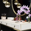 Elegant Vanity Table With Round Gold Mirror White Countertop And Purple Orchid