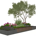 Outdoor Chair In Garden Space With Olive Tree Colorful Flowers And Wooden Concrete Planter