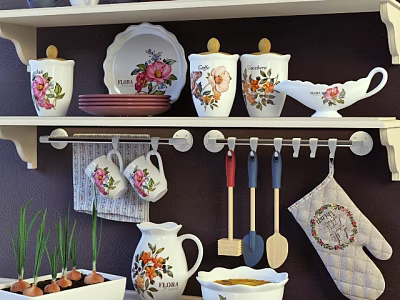 Floral Patterned Kitchenware Display On Shelves With Mugs Spatulas Oven Mitt And Bowls 3d model