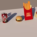 Delicious Fast Food Assortment With McDonalds Fries Hamburger Coca Cola And Lollipop